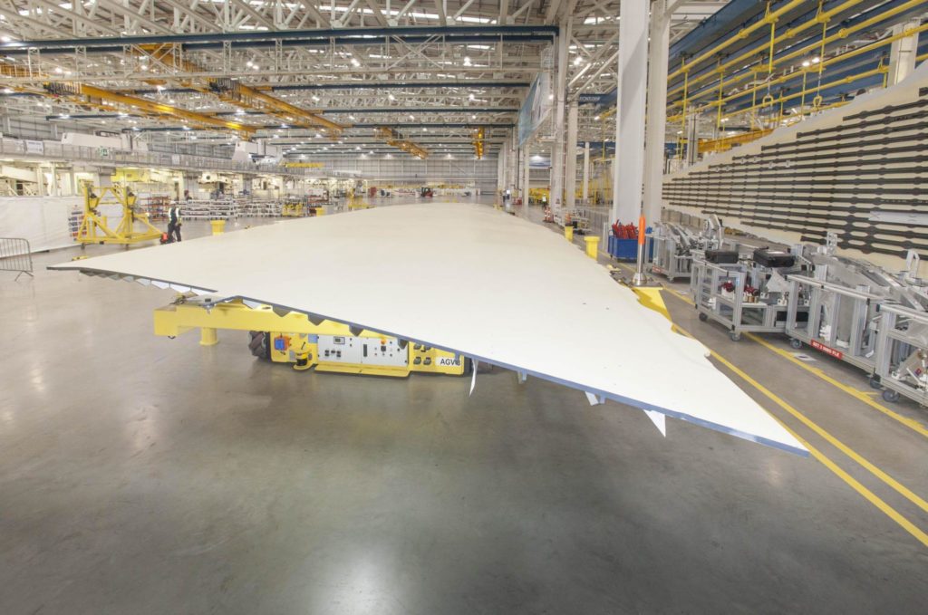 An Airbus wing cover goes into production