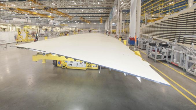 An Airbus wing cover goes into production