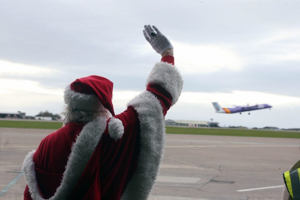 Santa waves passengers off at Cardiff Airport (Image: Cardiff Airport)