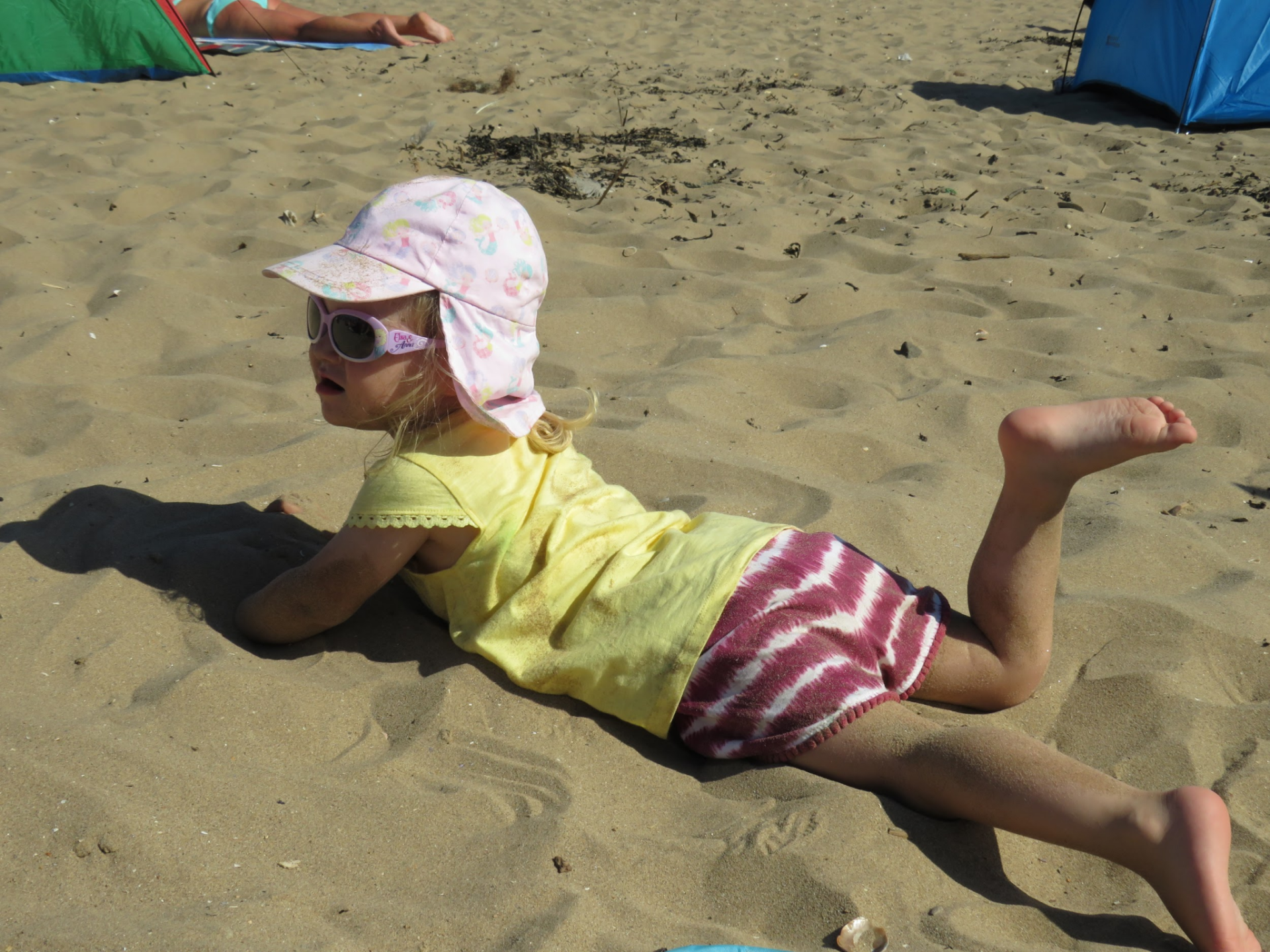 Ha yes you can cover me in suncream mum but then I'm going to make a sand angel and cake myself in sand!