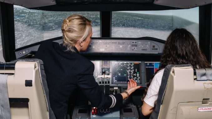 Trying out the simulator at the BA Flying Futures event (Image: BA / Stuart Bailey)
