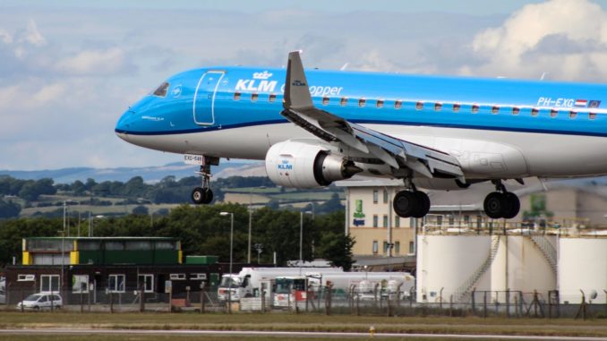 A KLM Embraer lands at Cardiff Airport (Image: TransportMedia UK)