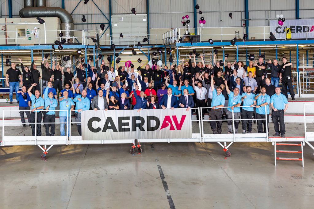 Caerdav’s engineering and training teams celebrate the new company name.