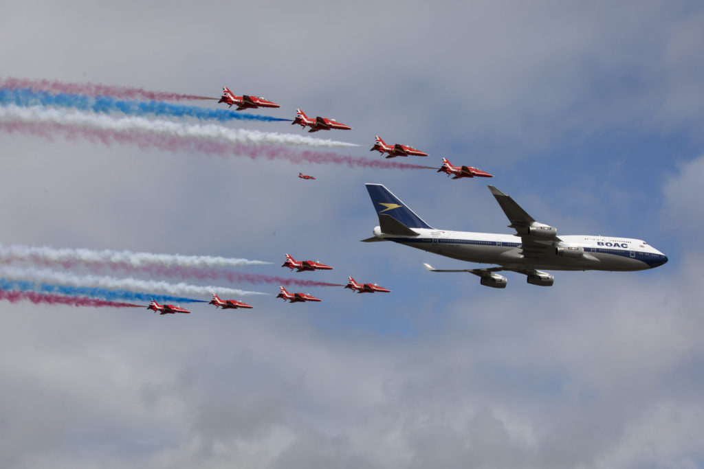 The Red Arrows performed a flypast with a British Airways Boeing 747 over the Royal International Air Tattoo. 