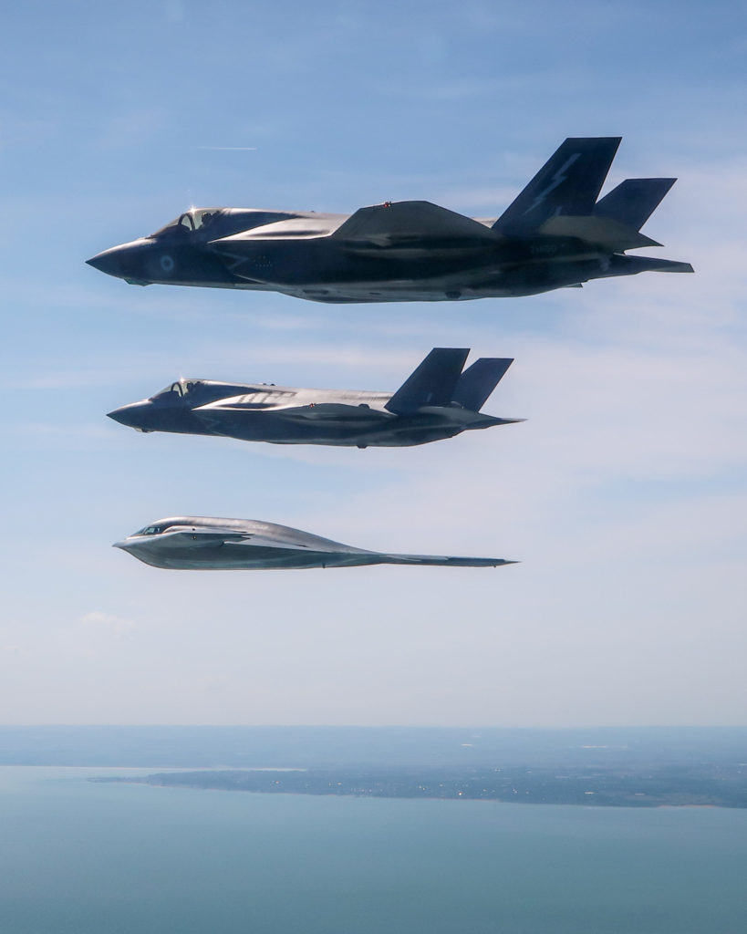 A United States Air Force B2 Spirit, currently deployed to RAF Fairford in Gloucestershire, flies above the English countryside near Dover with two RAF F-35 jets. -  Imagery captured by a USAF Exchange Pilot.