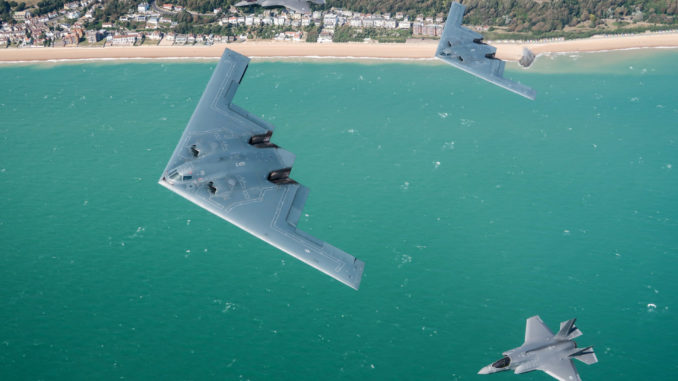 A United States Air Force B2 Spirit, currently deployed to RAF Fairford in Gloucestershire, flies above the English countryside near Dover with two RAF F-35 jets. For the first time, UK F-35 Lightning jets have been conducting integration flying training with the B-2 Spirit stealth bombers of the United States Air Force as part of their deployment to RAF Fairford in Gloucestershire, UK. The USAF deployment of the B-2’s from the Bomber Task Force Europe is long-planned. Whilst deployed to the UK the aircraft will conduct a series of training activities in Europe. During this deployment, RAF F-35B Lightning fighters are conducting sorties with the USAF B-2 bombers. Both are 5th generation aircraft and this is the first time that USAF B-2’s have trained with non-US F-35’s. RAF Fairford routinely hosts deployments and exercises by US strategic aircraft. These regular deployments reinforce the US Air Force Europe and the Royal Air Force’s unique and complementary partnership and our collective contribution to NATO. Imagery captured by a USAF Exchange Pilot.