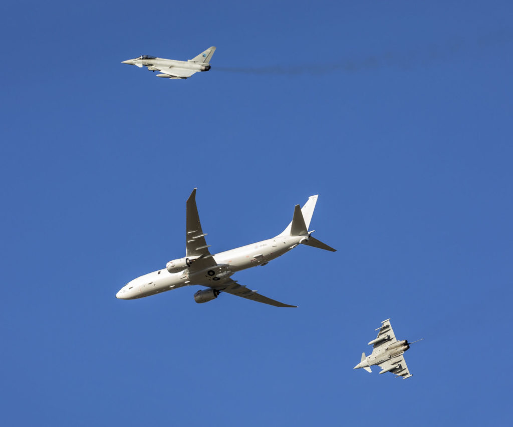 Two Royal Air Force Typhoon aircraft from II(AC) Squadron escort the Poseidon over Kinloss. (©Crown Copyright 2020)