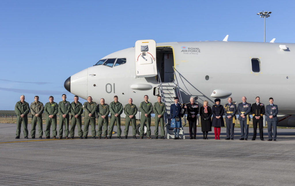 The Poseidon crew and VIPs stand in front of the new RAF P-8A Poseidon. (©Crown Copyright 2020)