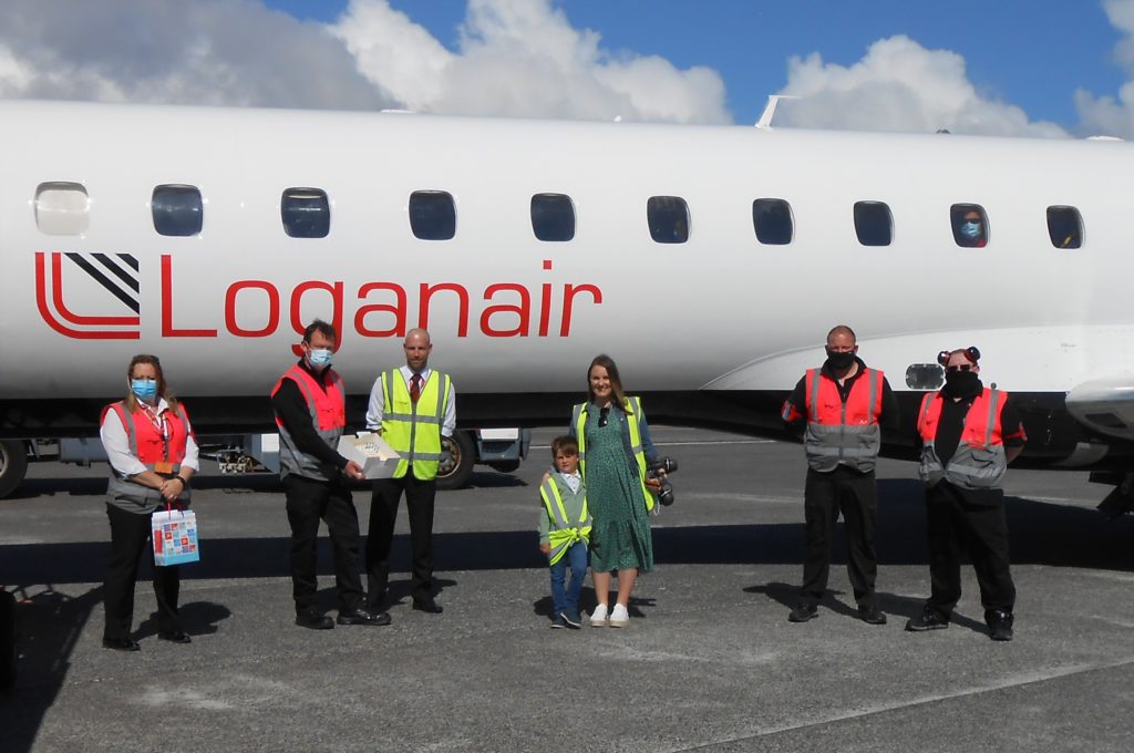 George with Loganair team at Benbecula Airport