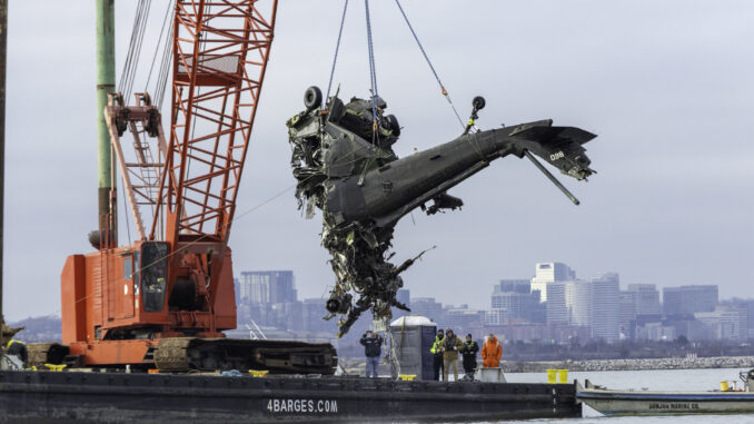 The wreckage of the US Army Blackhawk is recovered from the Potomac River (Image: NTSB/Public Domain)