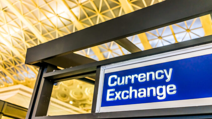Closeup of currency exchange sign inside building Closeup of currency exchange sign inside building