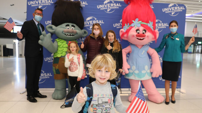 Pictured are Rachel Charlesworth, Annie Charlesworth (10), Flecity Charlesworth (6) and Elliott Charlesworth (4) from Stoke, with Universal Studios Shrek and Trolls characters at check-in for the Aer Lingus UK inaugural flight from Manchester Airport direct to Orlando.