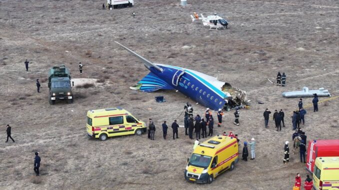 An image, widely shared on social media, shows emergecy crews at the wreckage of the Azerbaijan Airlines Embraer E190