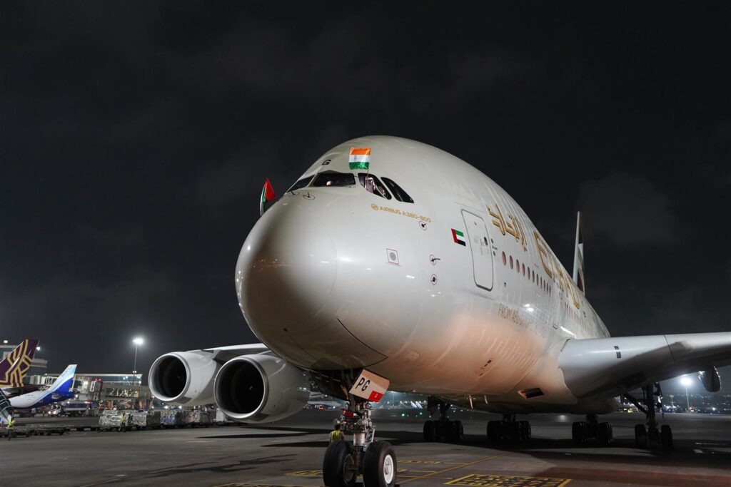 Etihad pilots wave the UAE and Indian flags from the A380 cockpit in Mumbai