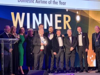 Loganair team collecting Domestic Airline of the Year Award