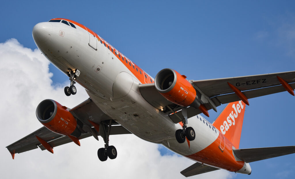 An easyJet Airbus lands at Gatwick Airport (Image: UK Aviation Media)