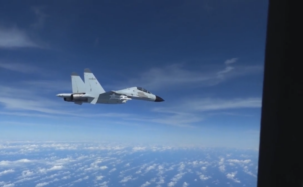 Chinese J11 Fighter intercepting US RC135