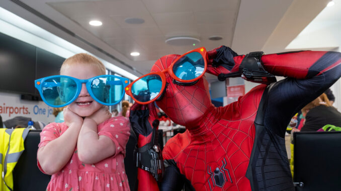 Spider-Man and a child who lives with a life shortening condition in Glasgow Airport's Campsie Lounge Spider-Man and a child who lives with a life shortening condition in Glasgow Airport's Campsie Lounge