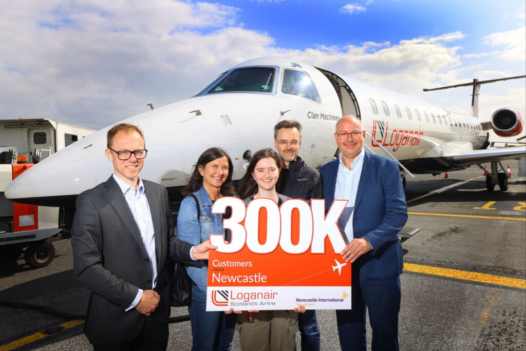 pictured (l-r) Nick Jones (CEO at Newcastle Airport), Goro, Emma and Stephen Pattie & Luke Farajallah (CEO at Loganair)