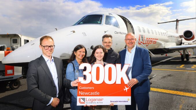 pictured (l-r) Nick Jones (CEO at Newcastle Airport), Goro, Emma and Stephen Pattie & Luke Farajallah (CEO at Loganair)